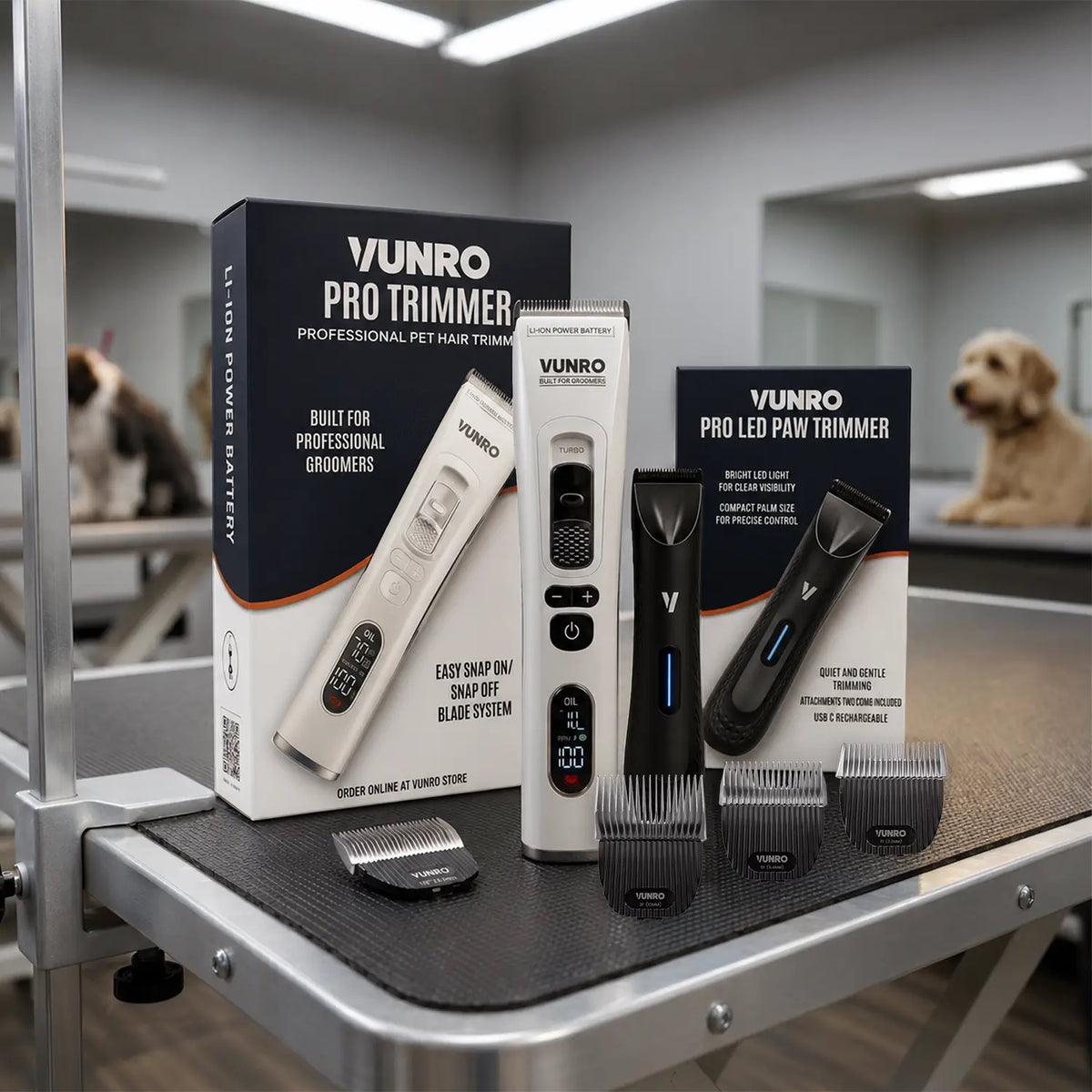 VUNRO Full Groom and Detail Trimmer Kit with two clippers, paw trimmers, blades and boxes on a grooming table